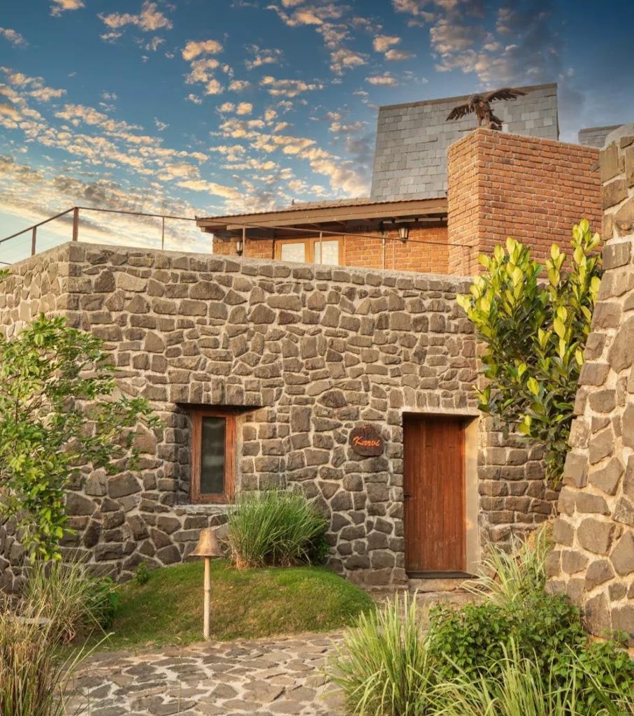 Karvi entrance in stone and brick at twilight